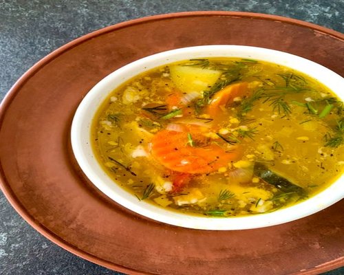 bowl of simple homemade hungarian style soup with vegetables